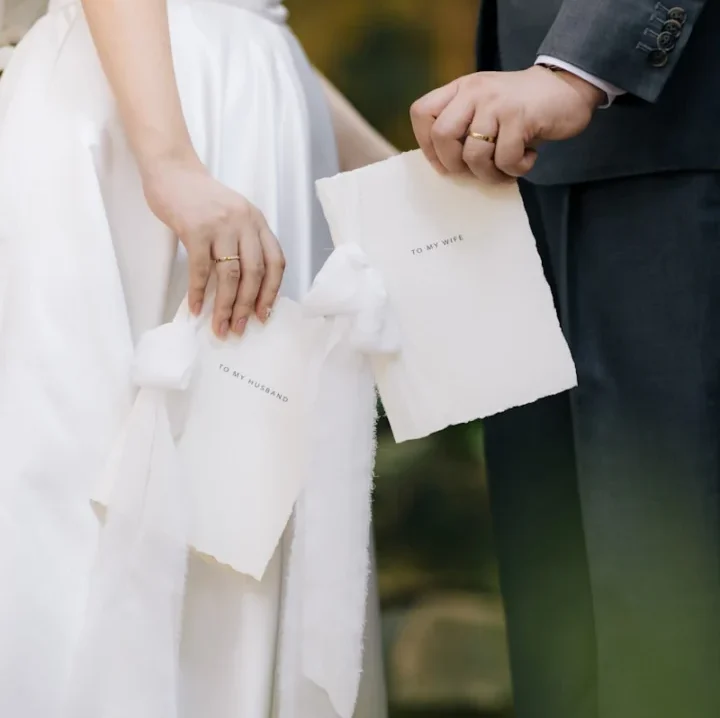 A man and a woman standing next to each other