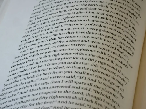 Close-up of an open book with text.