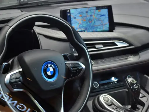 shallow focus photo of black BMW steering wheel