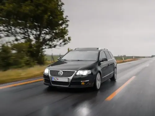 black mercedes benz suv on road during daytime